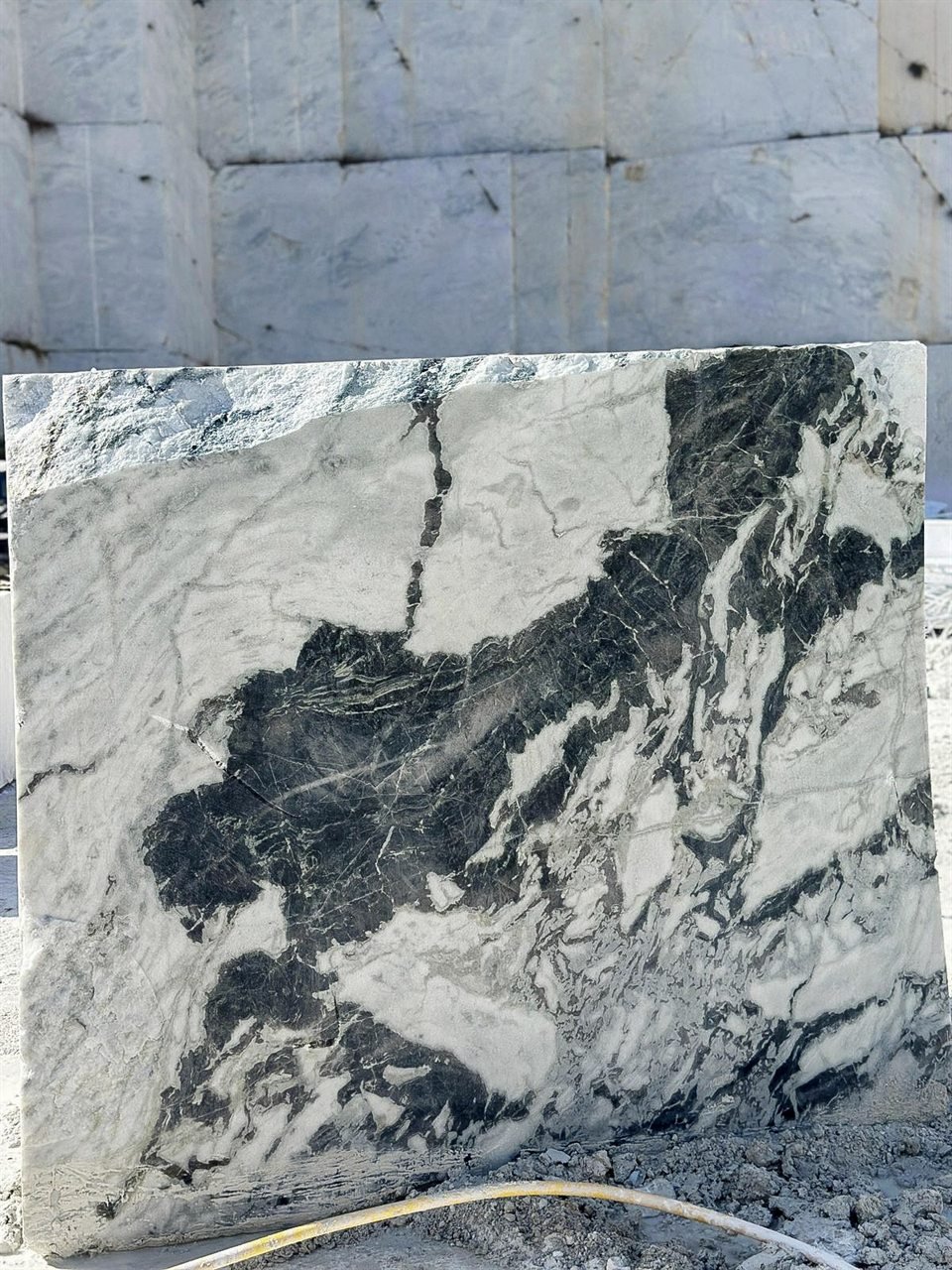 Raw marble block at a quarry site in Rajasthan, before transport to processing